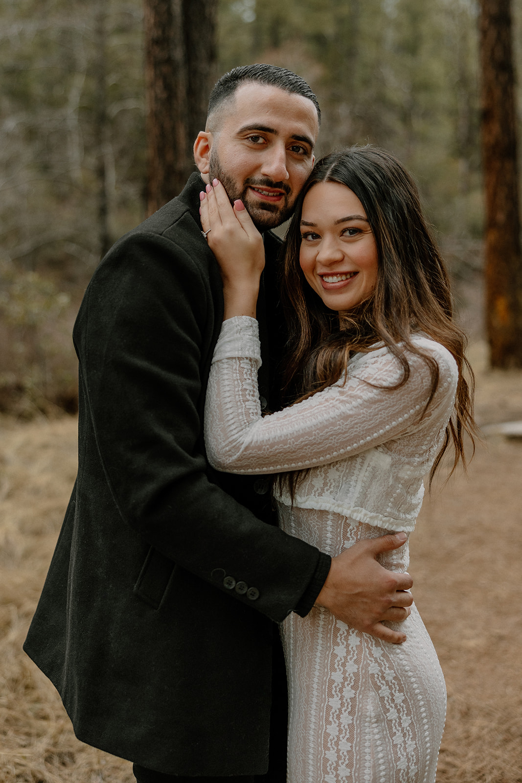 beautiful couple pose together in the Arizona wilderness