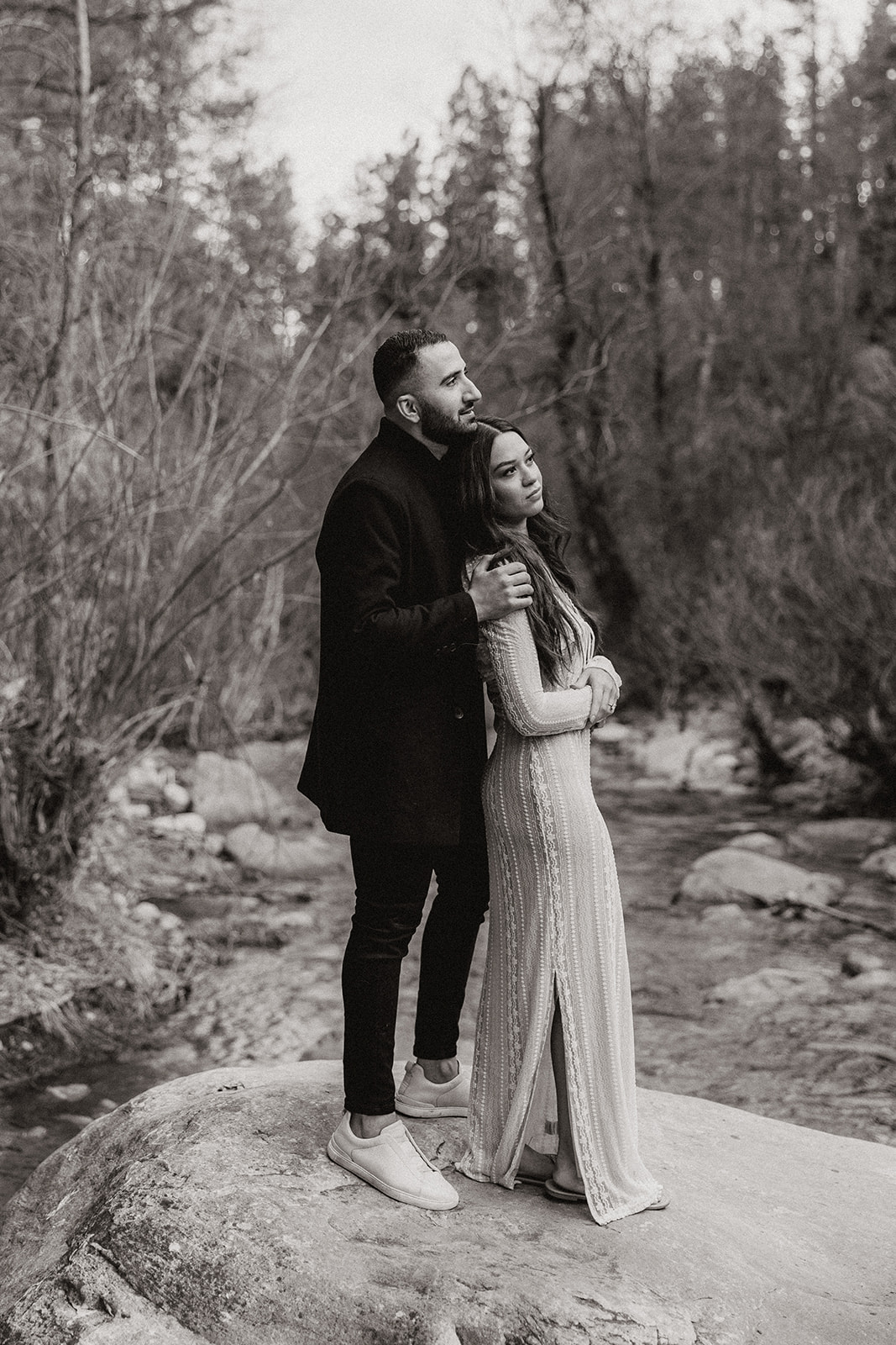 beautiful couple pose together in the Arizona wilderness