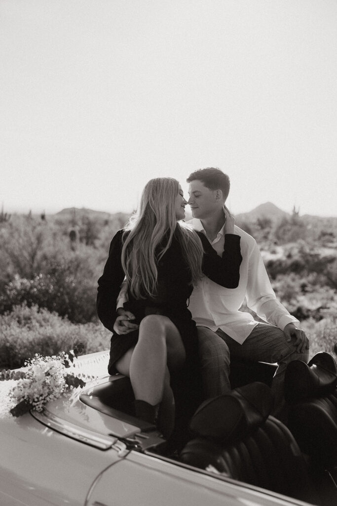 couple poses in the Arizona desert