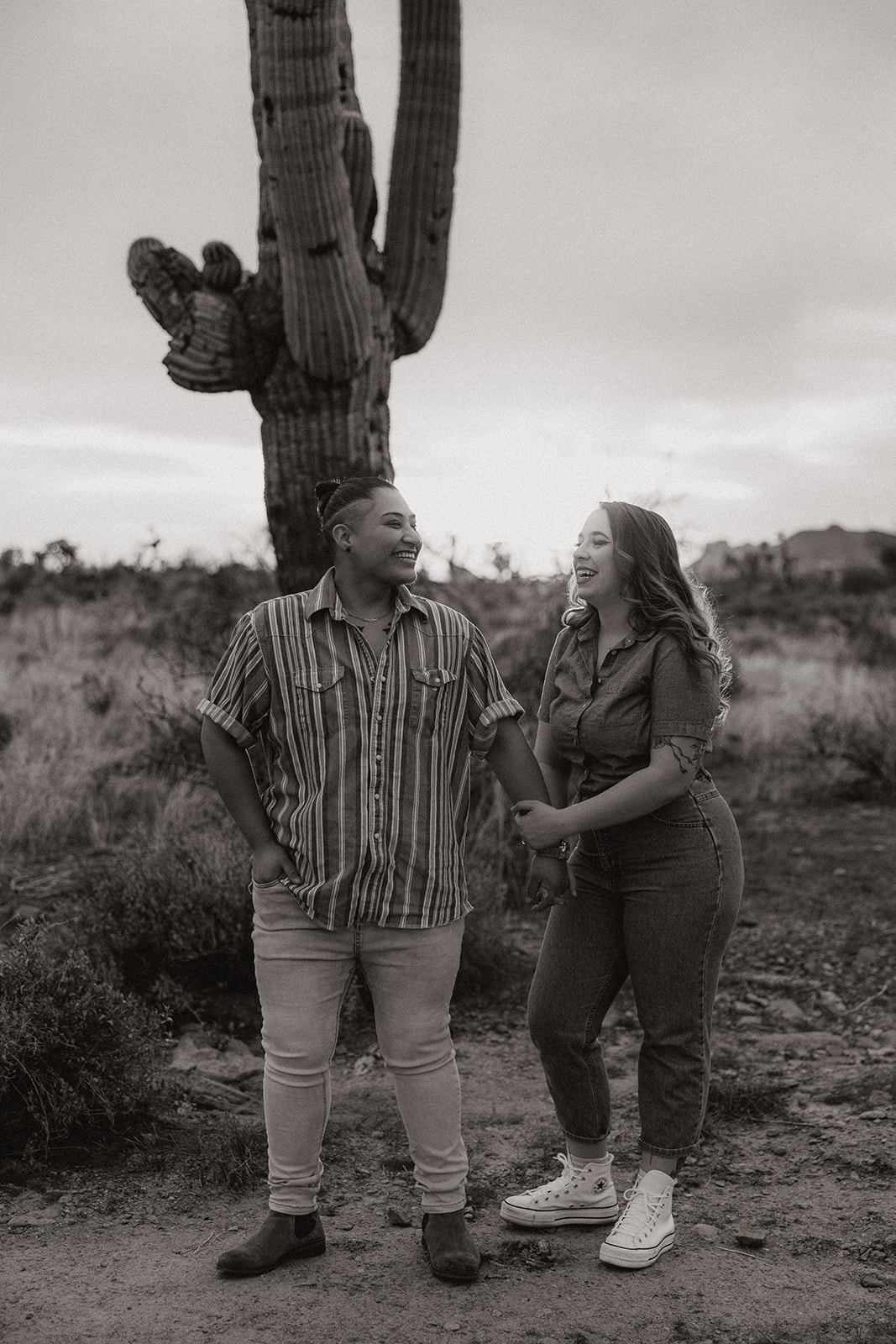 beautiful couple pose together in the Arizona desert