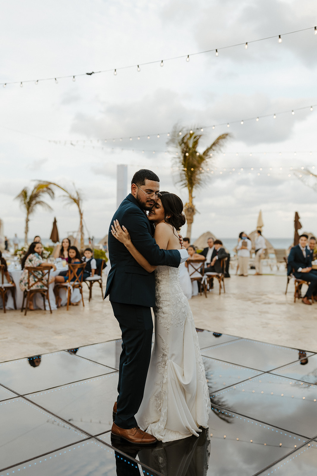 bride and groom enjoy a first dance during destination wedding in cabo