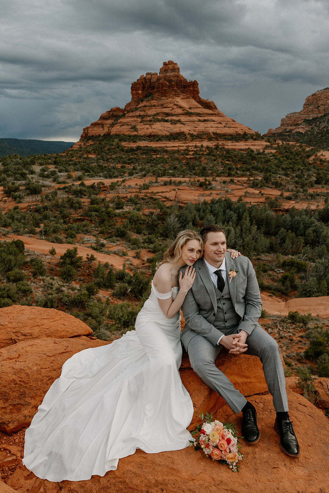 bride and groom pose a photo in the arizona desert learn everything getting married in arizona