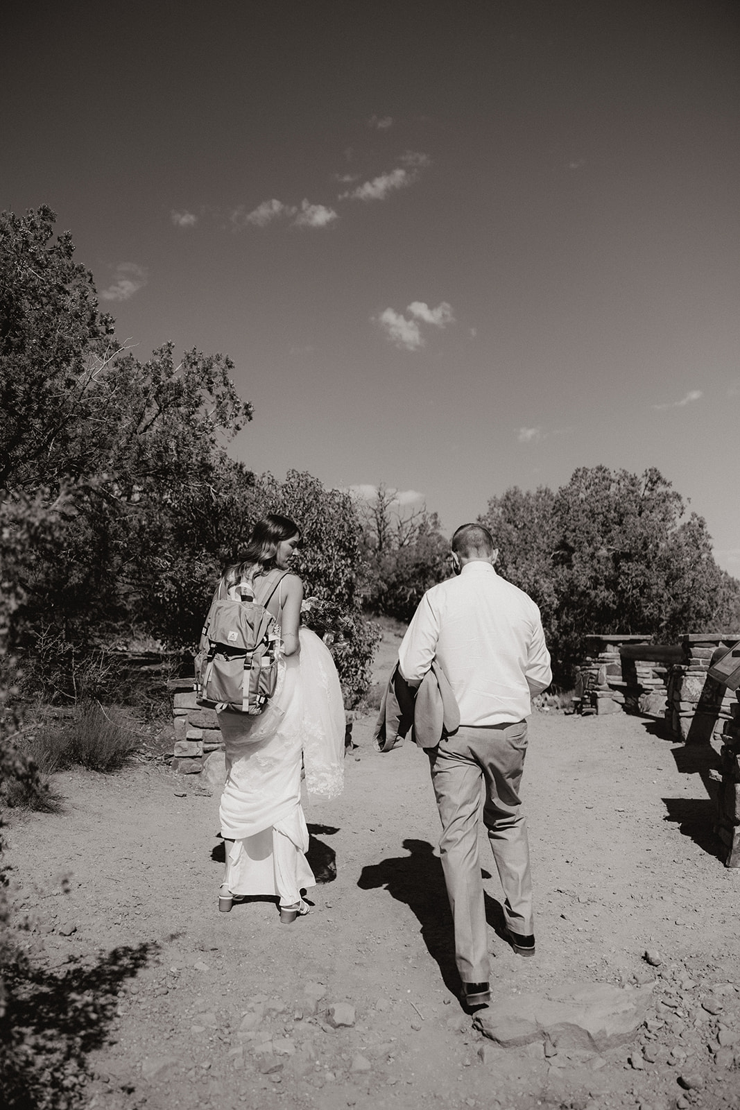 bride and groom start their hike into the Arizona desert!