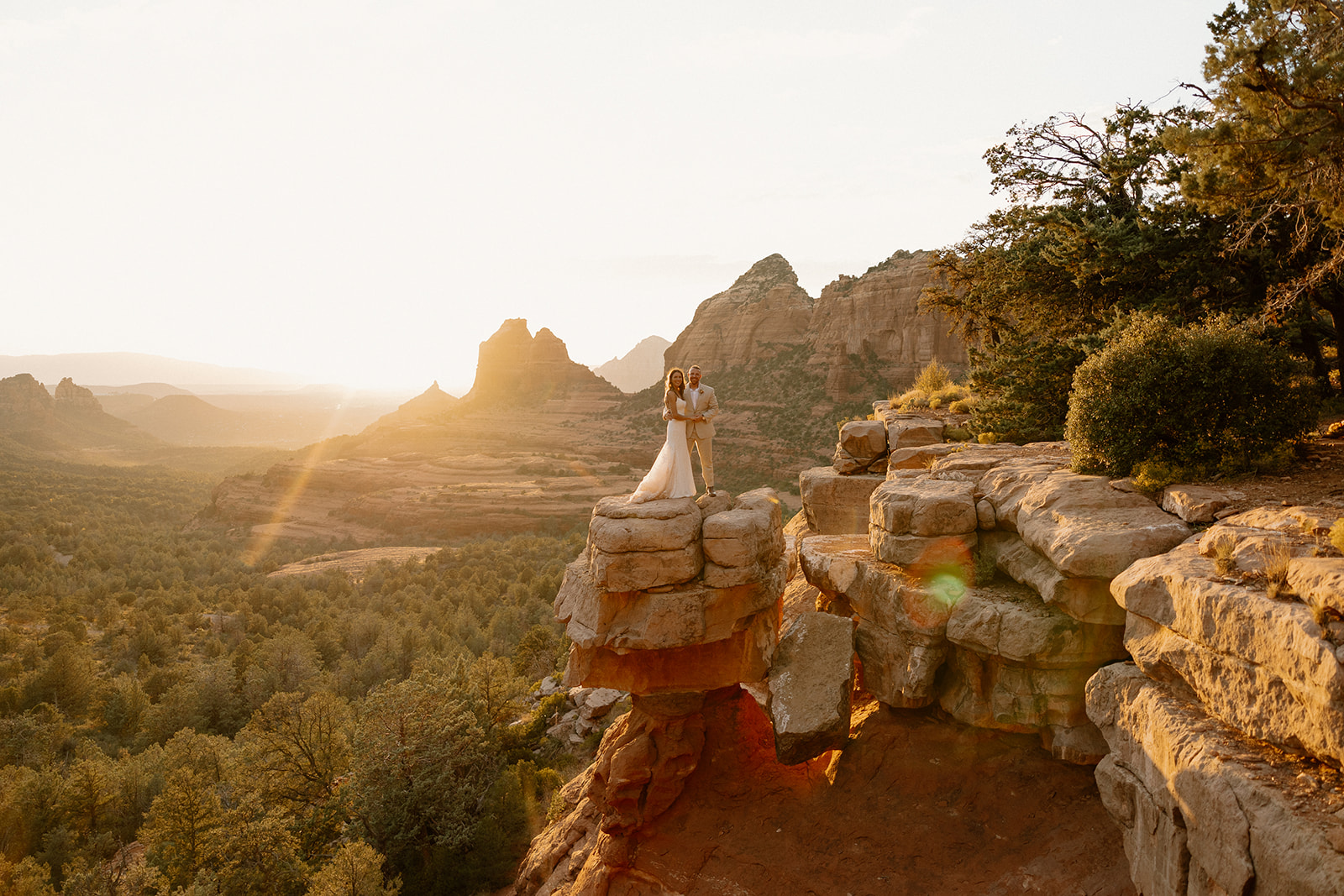 beautiful bride and groom pose together for a romantic photo in the Arizona nature