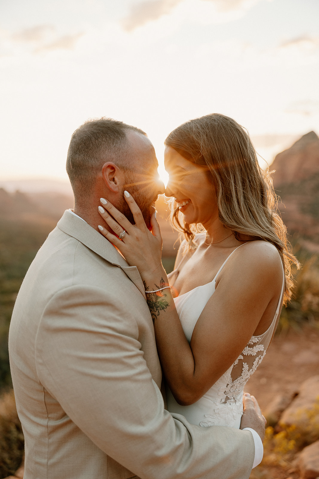 stunning bride and groom pose together for a romantic photo in the Arizona nature