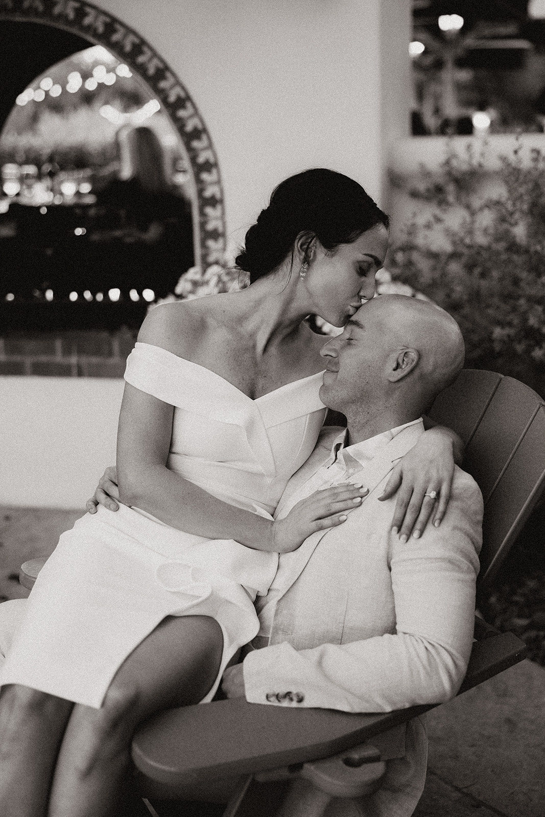 bride and groom share an intimate moment together during their wedding day rehearsal