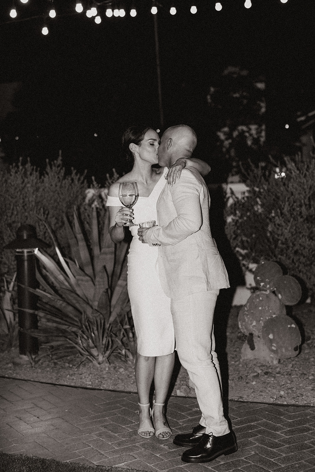 bride and groom share an intimate moment together during their wedding day rehearsal