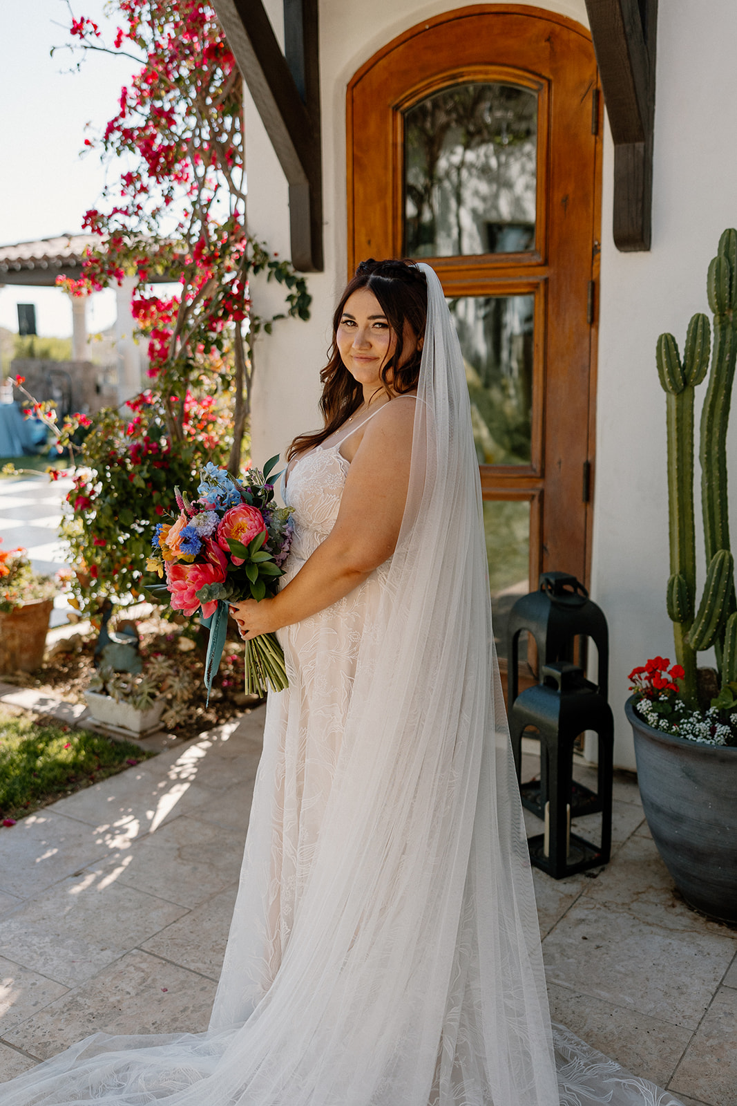 bride poses for a photo before getting married in arizona