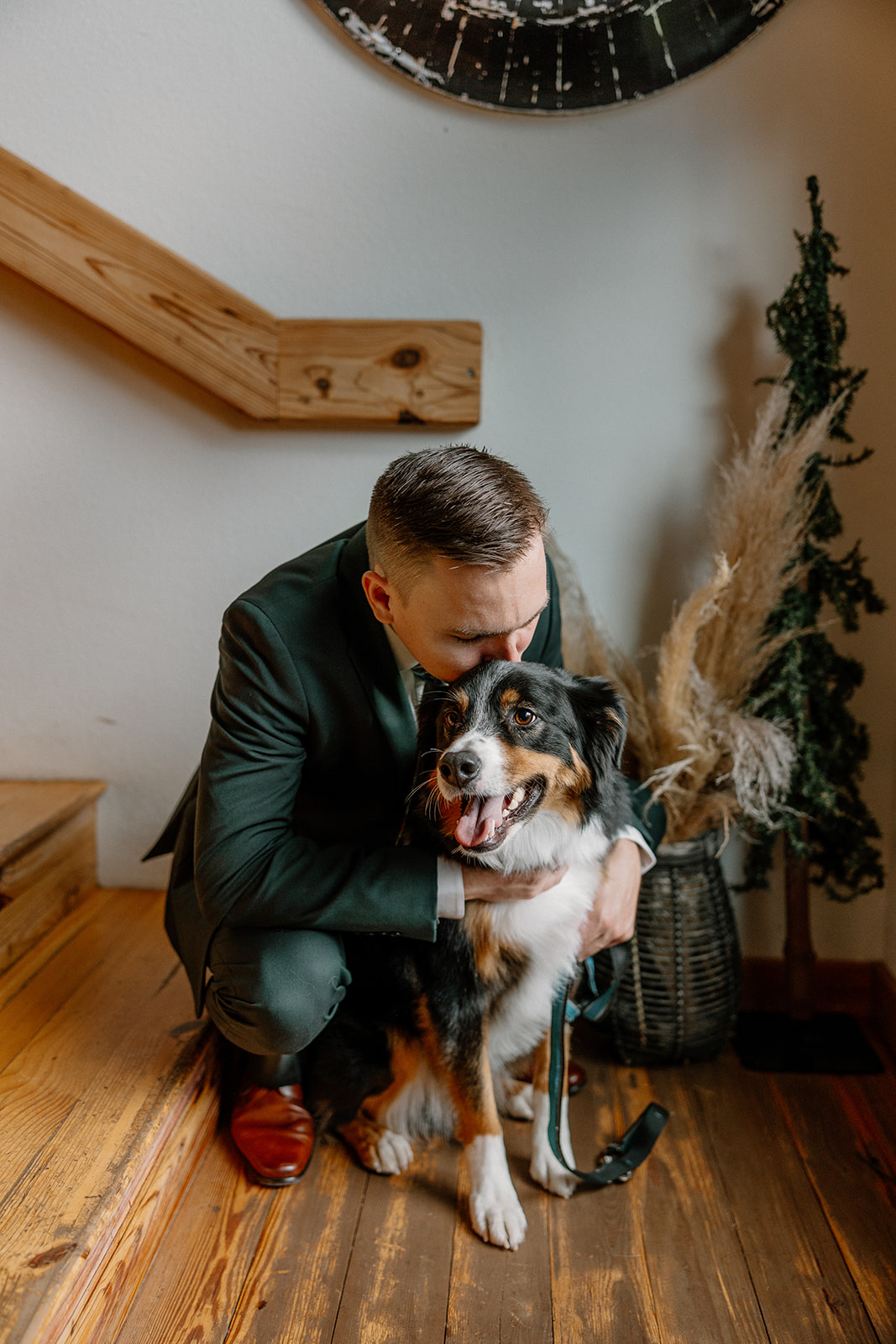 Groom poses with his dog before his Arizona wedding day