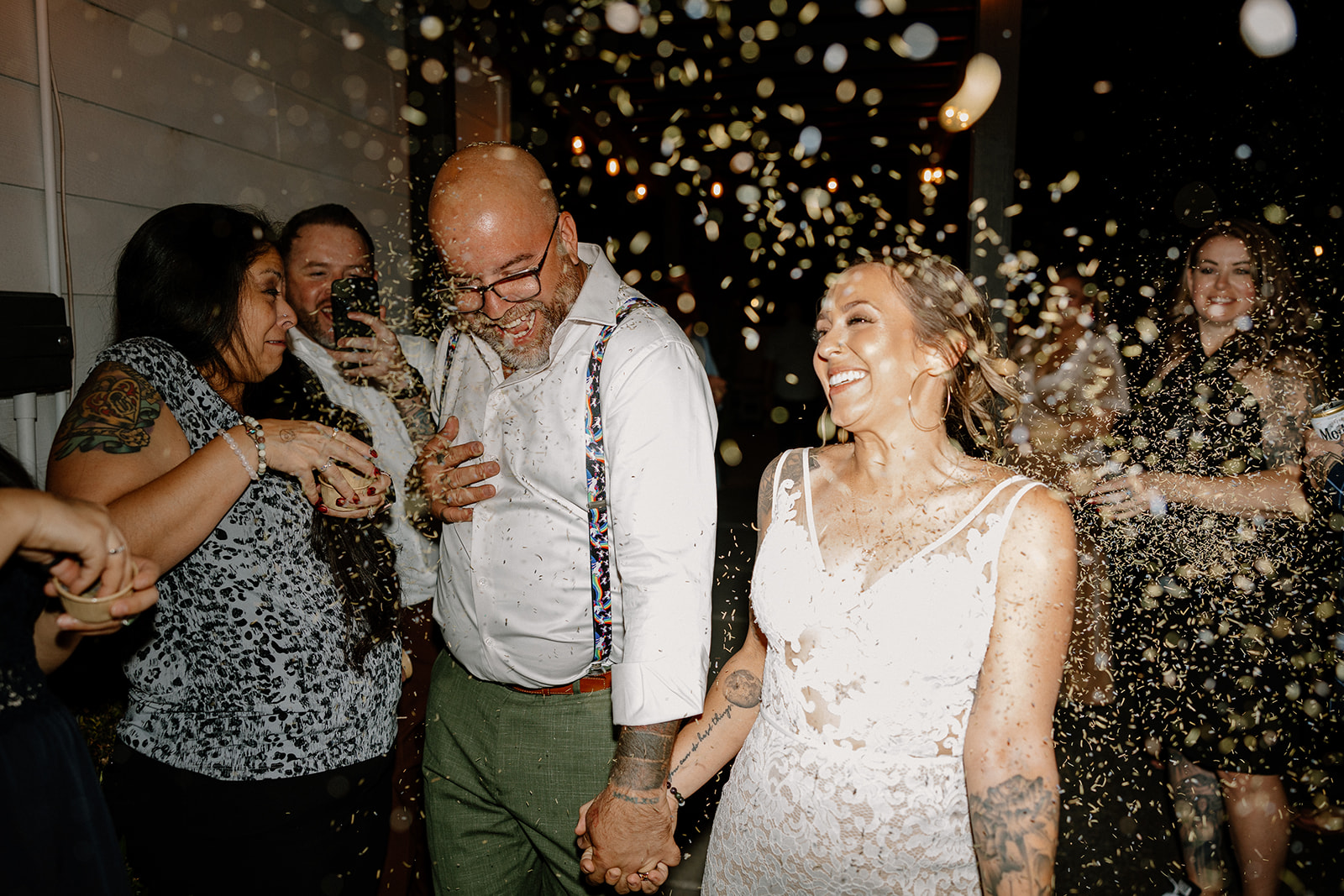 bride and groom exit their dreamy wedding at the cottage in gilbert az