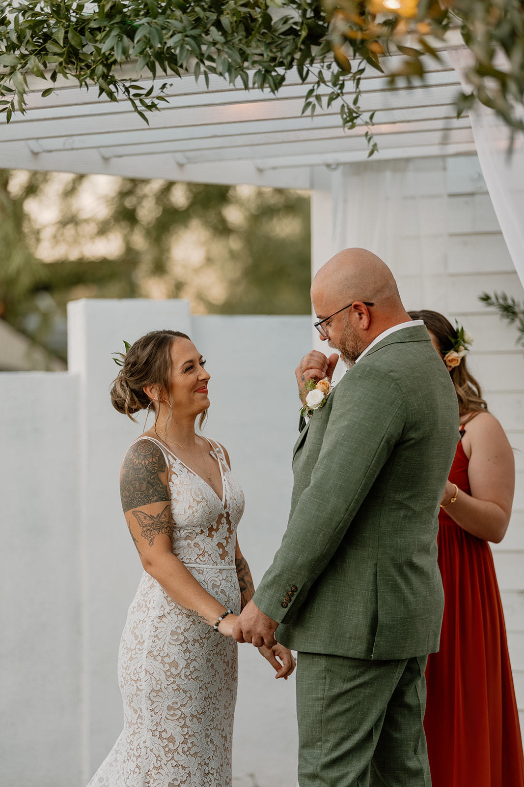 bride and groom share intimate moments during their cottage wedding ceremony in Arizona