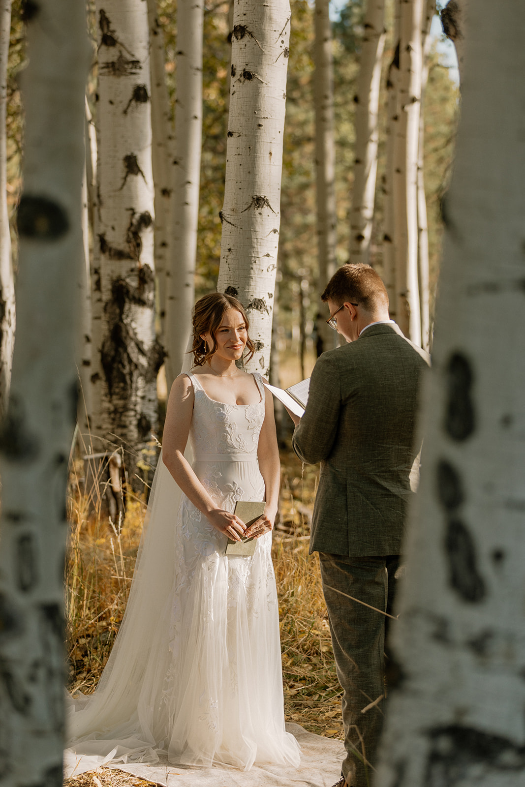 beautiful Fall Flagstaff wedding ceremony hidden in the trees