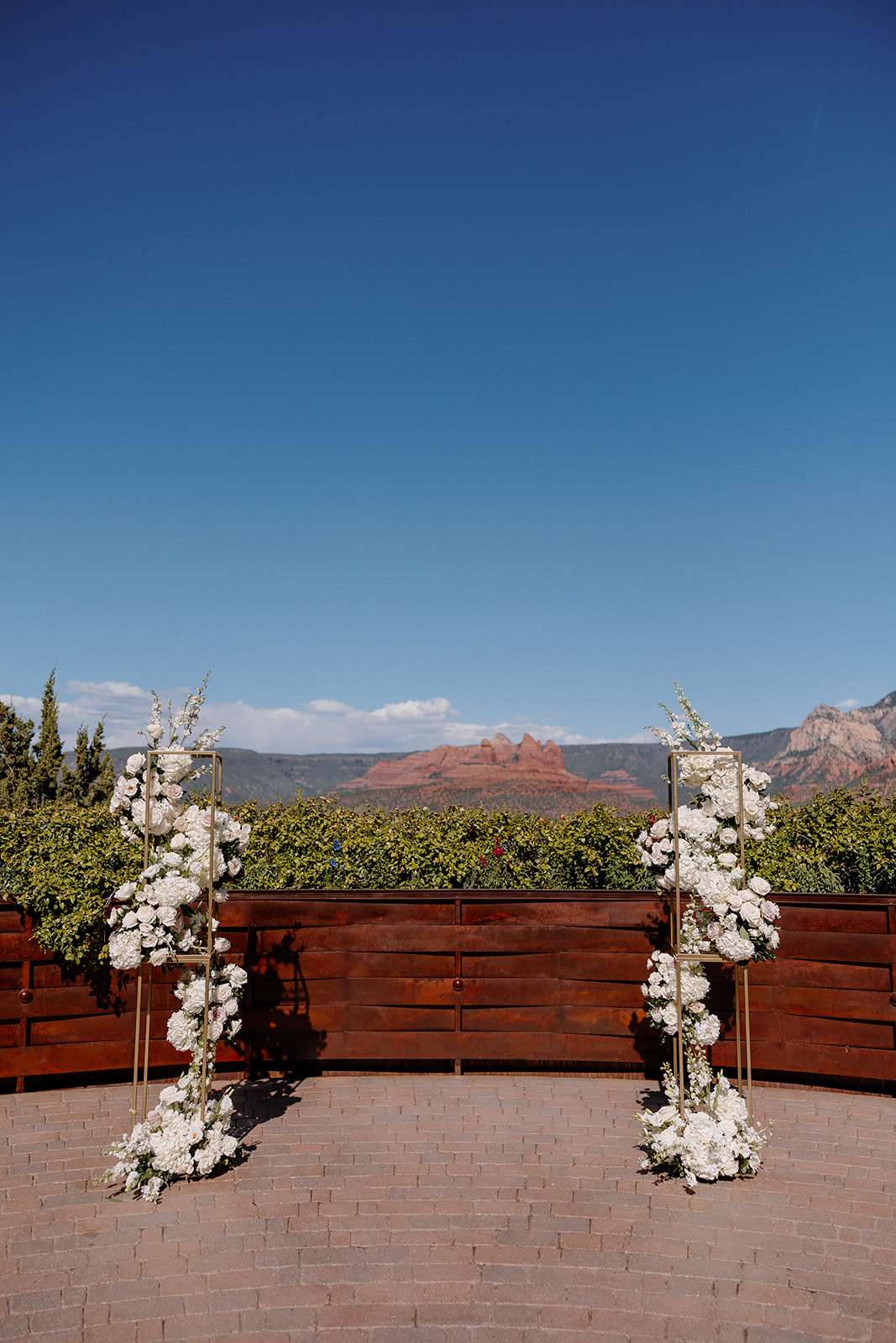 Flower arrangements at ceremony site with beautiful Arizona scenary