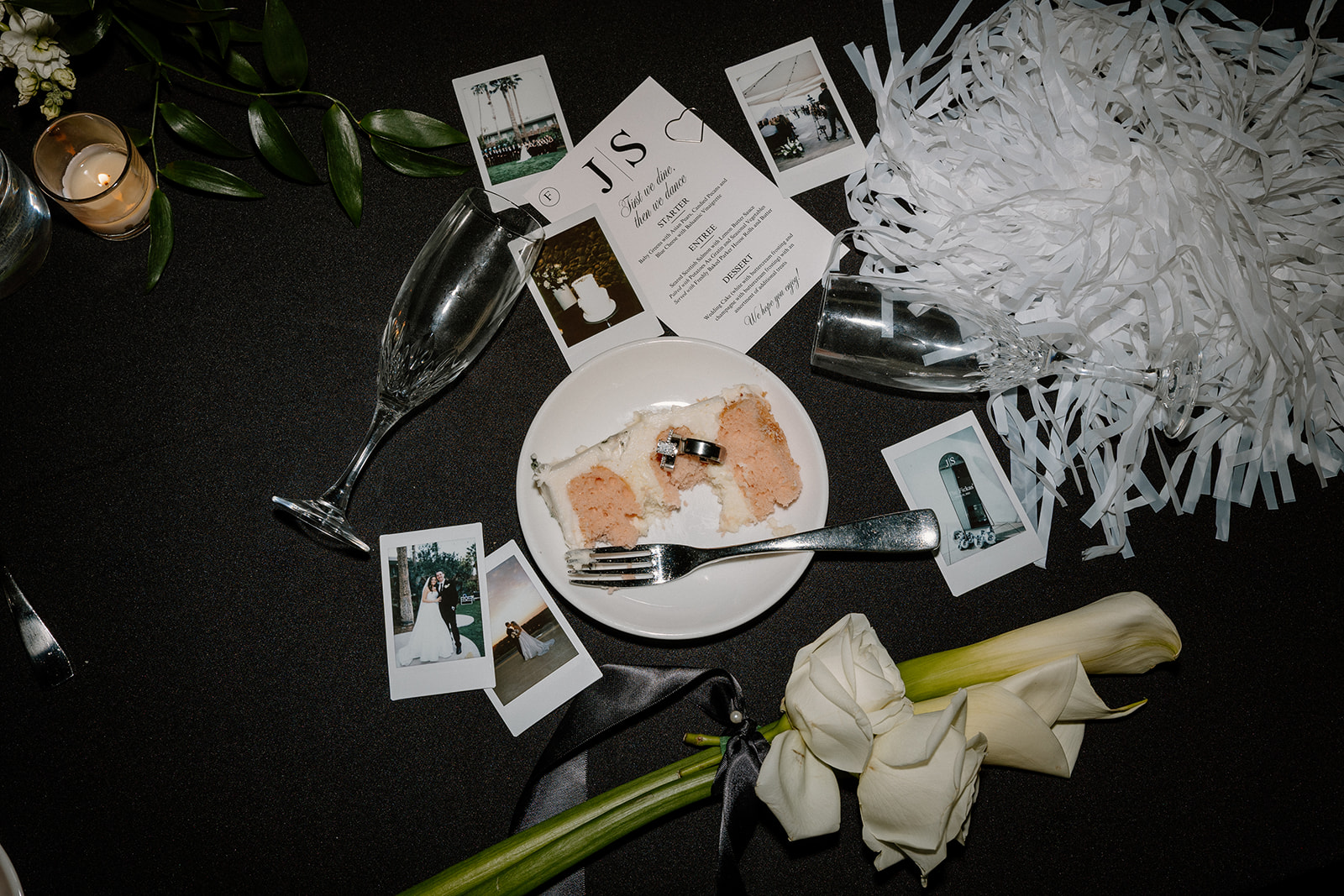 late night wedding details after ceremony with wedding rings, champagne glasses, cake, and flowers