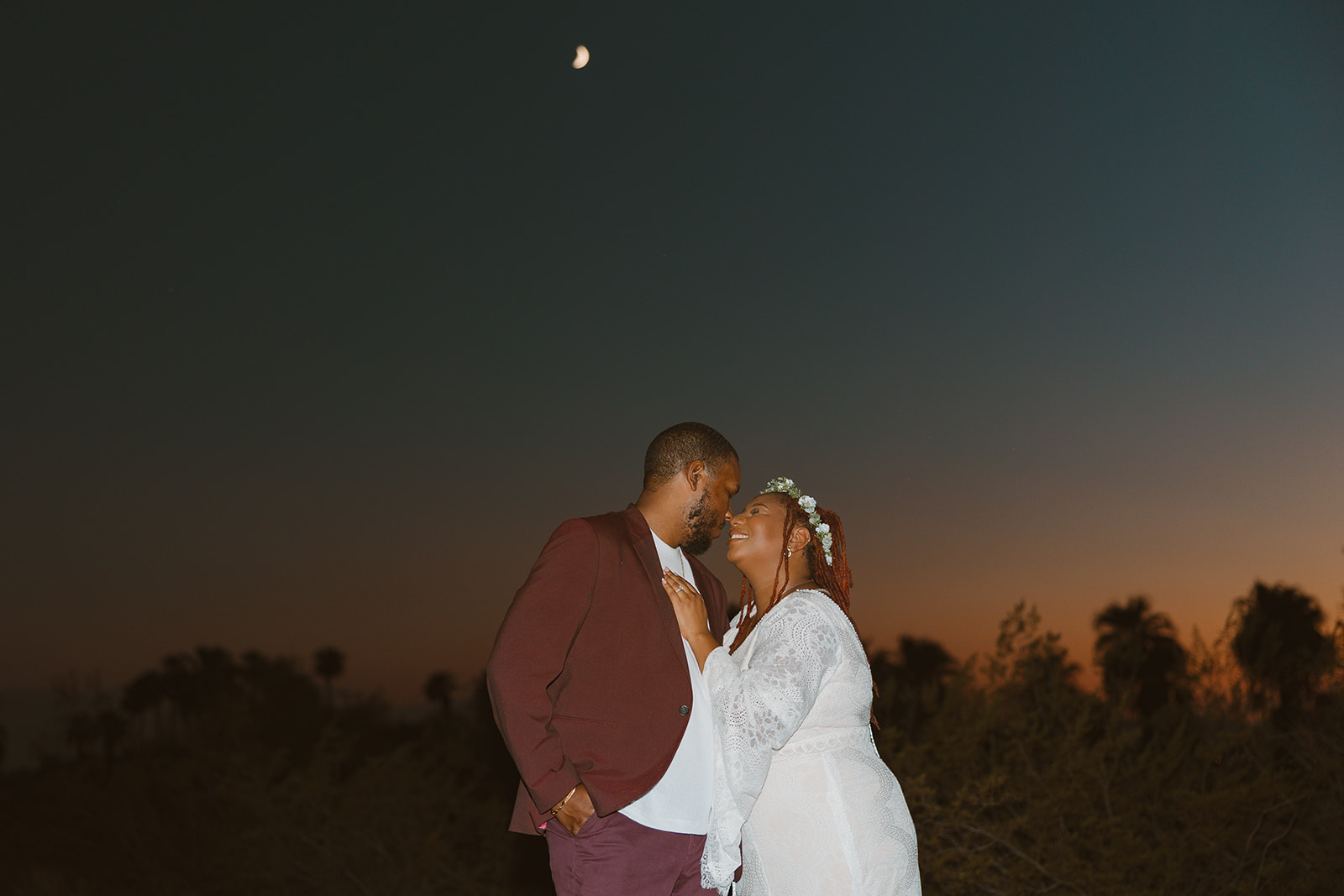 stunning couple share intimate moments together during sunset