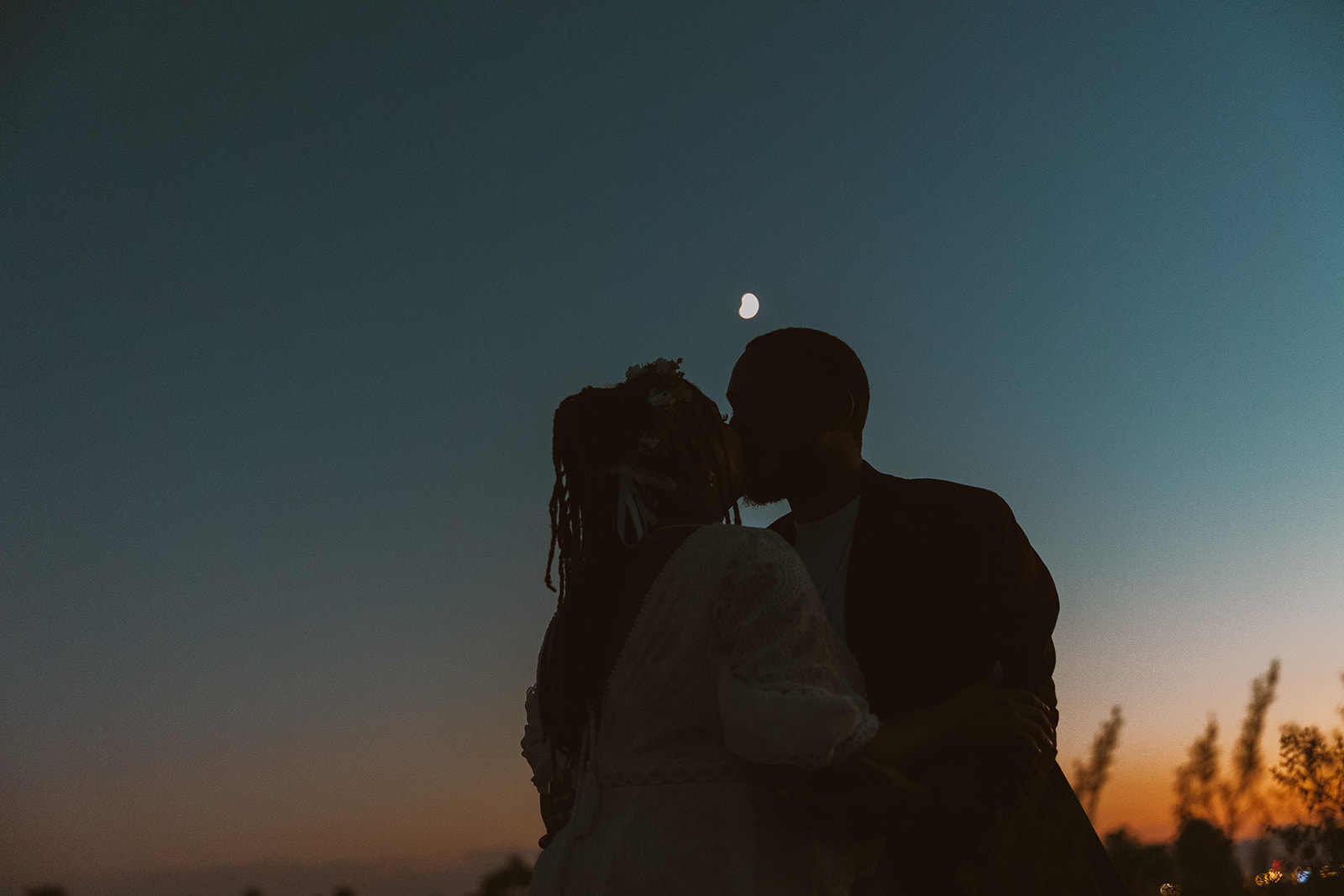 stunning couple share intimate moments together during sunset