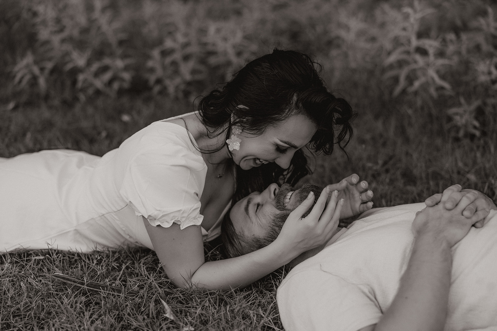 beautiful couple share intimate moments together in the greenery during their Mesa Arizona Engagement Photos