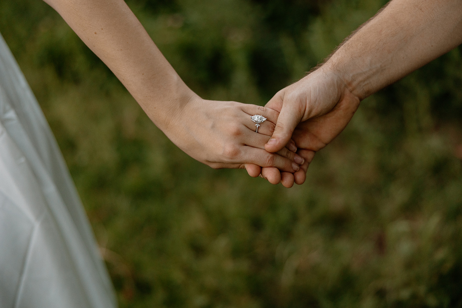 ring detail photo from a dreamy outdoor engagement photoshoot