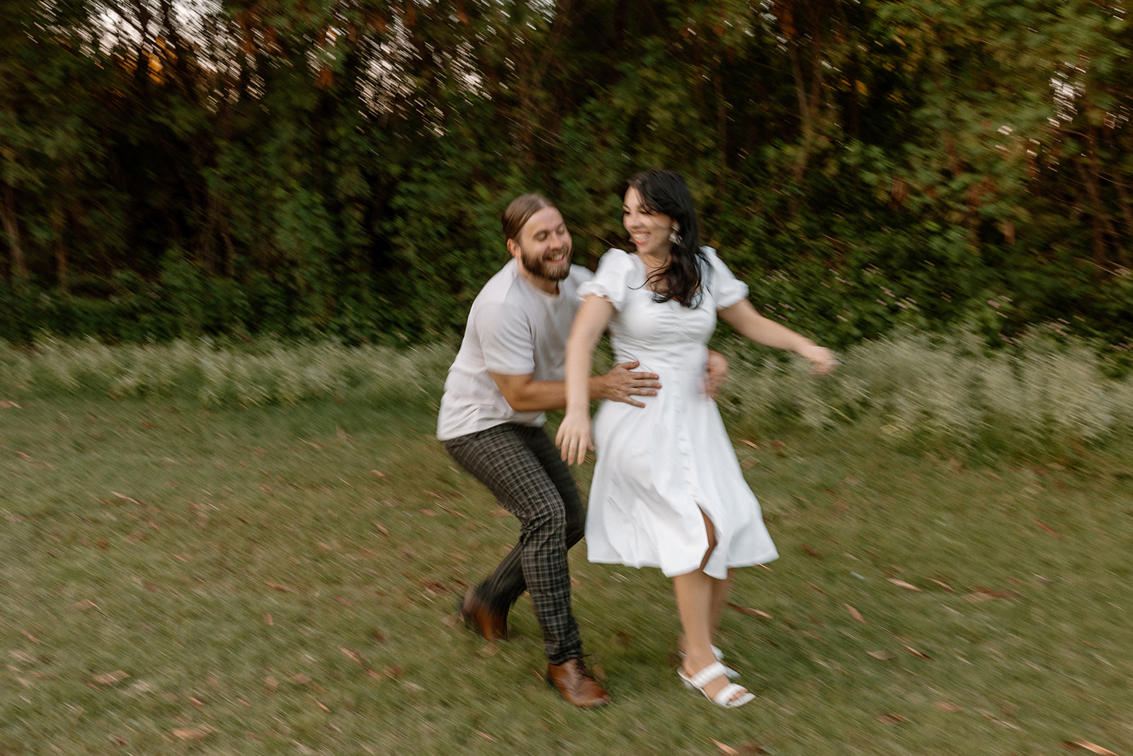 Playful documentary style engagement photos from a beautiful greenery filled Arizona engagement photoshoot