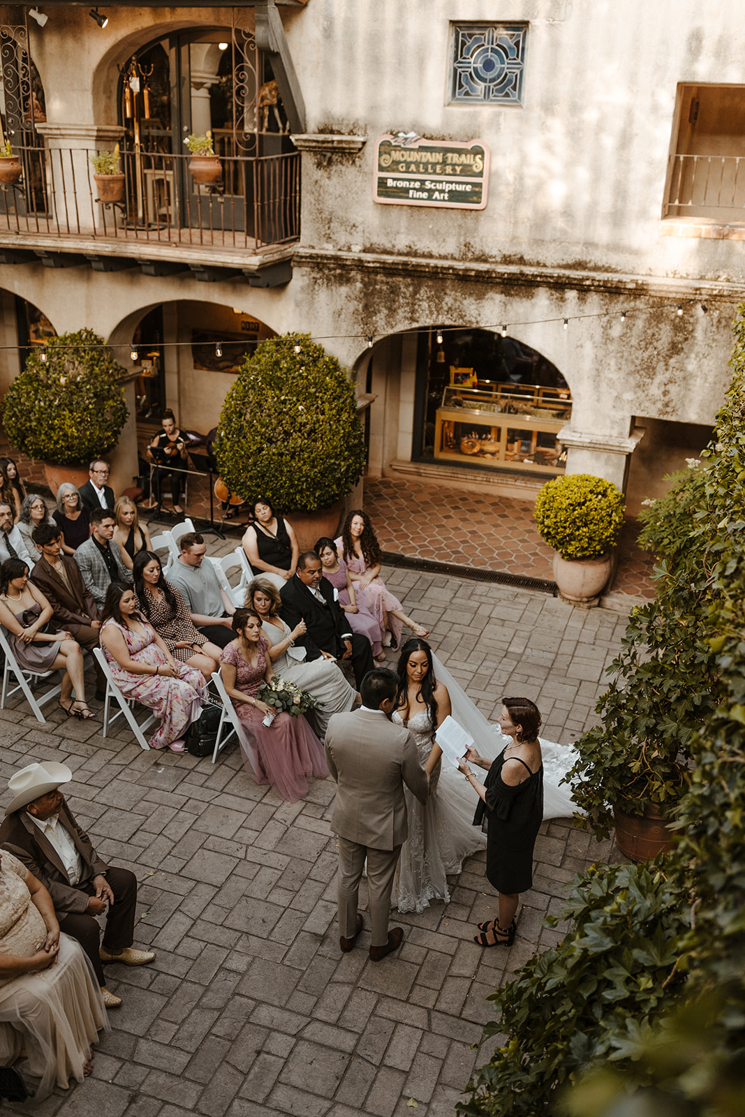 Tlaquepaque outdoor wedding ceremony with guests sitting and watching