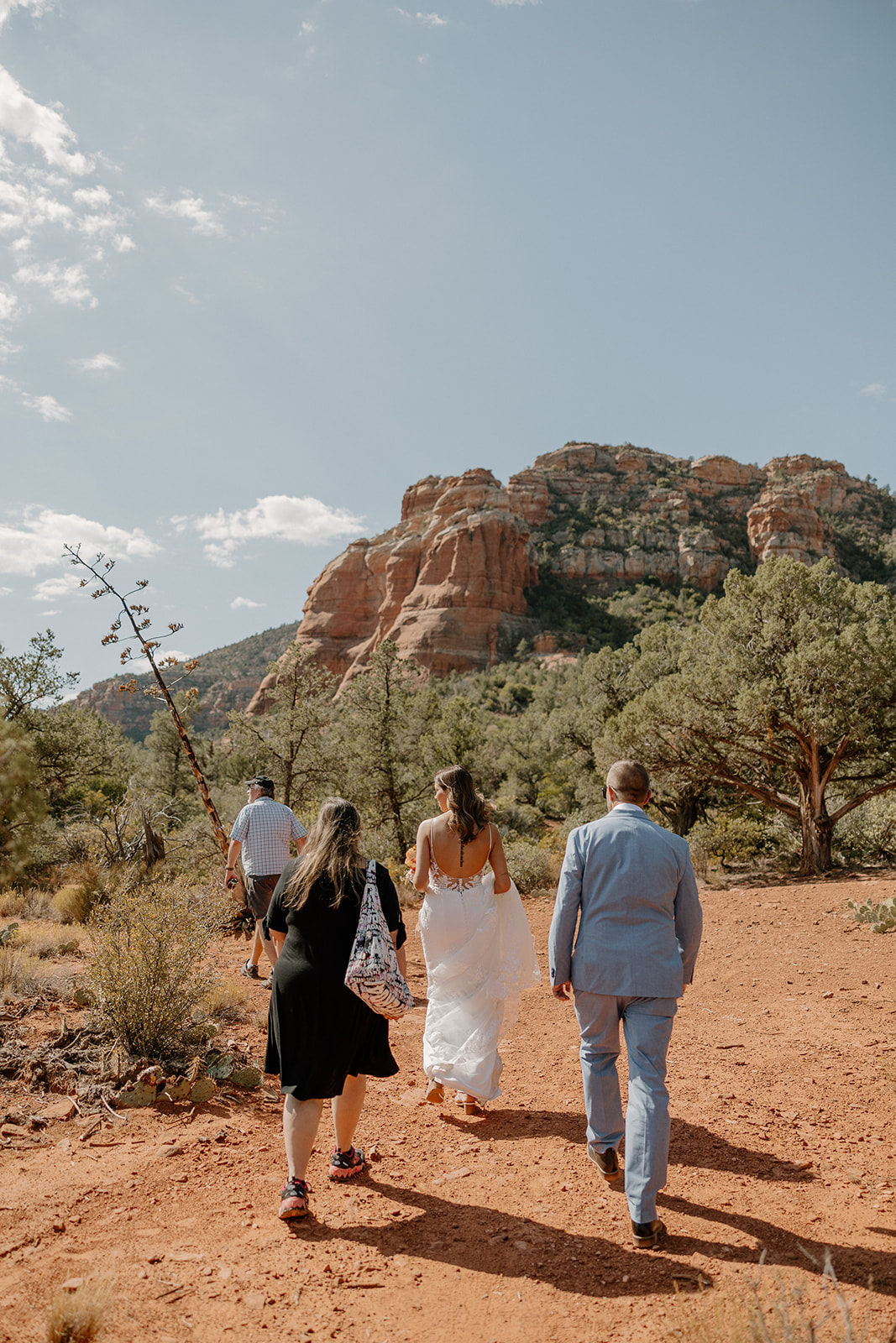 Couple walking to ceremony point in Arizona
