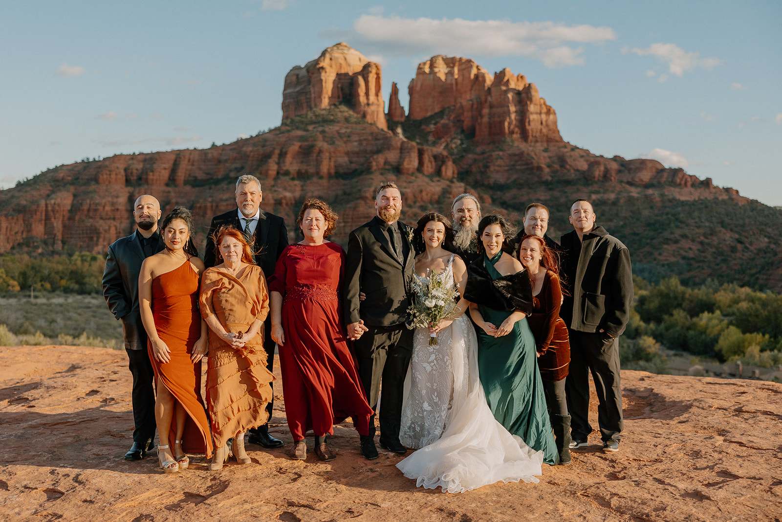 Elopement family portrait in front of Sedona’s iconic Bell Rock, celebrating the Arizona elopement crew.