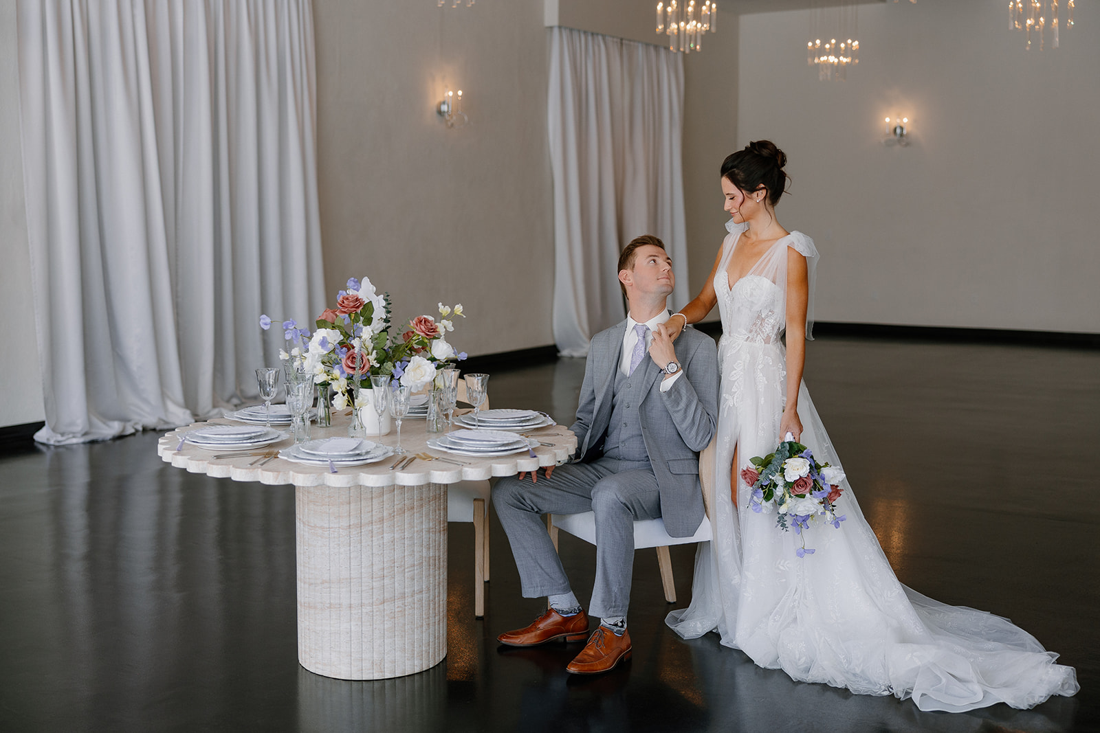 Bride and groom looking at one another after intimate wedding at Soho63 in Chandler Arizona