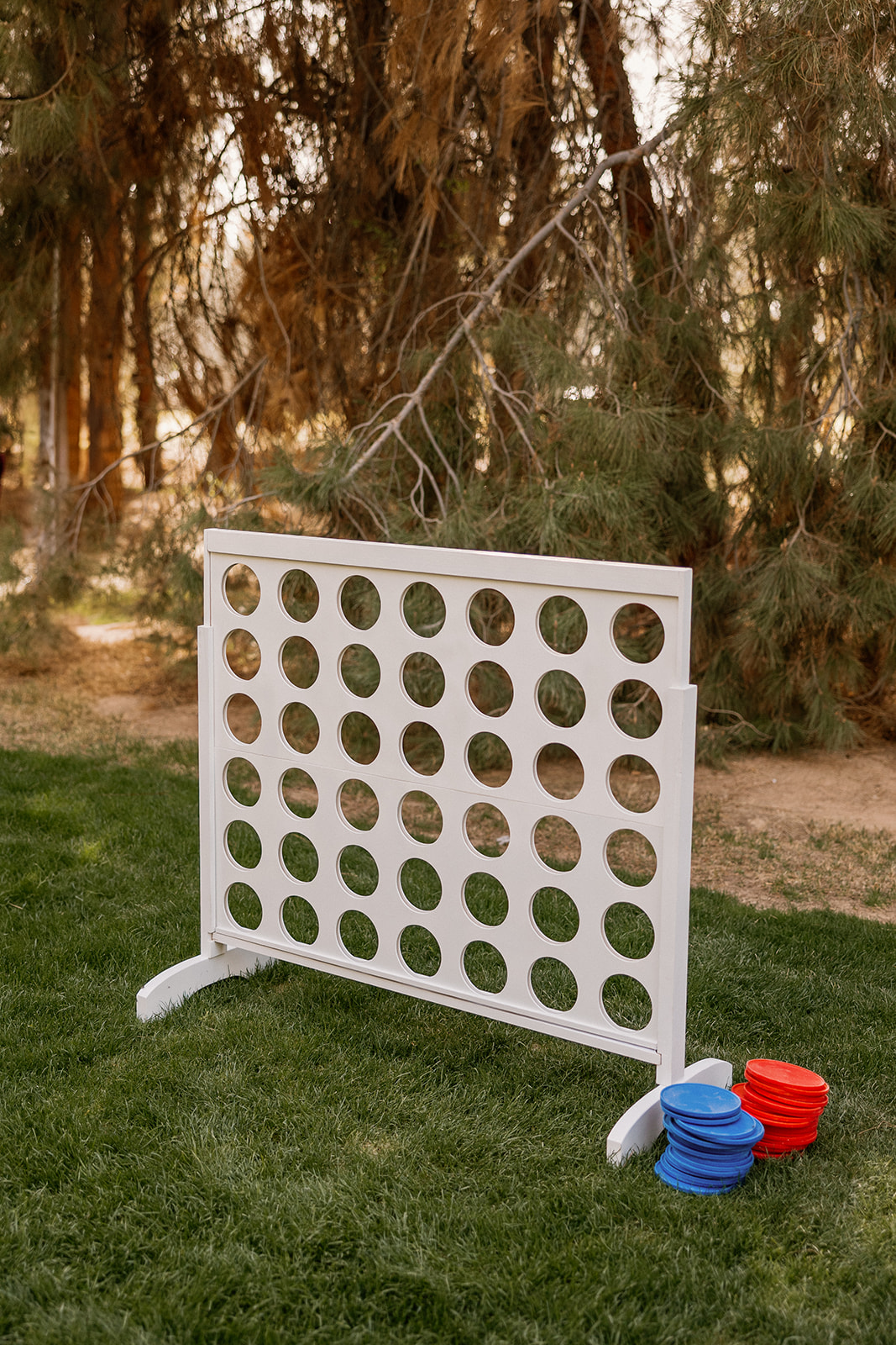 Large outdoor connect four game for outdoor play set up for outdoor reception at Schnepf Farms