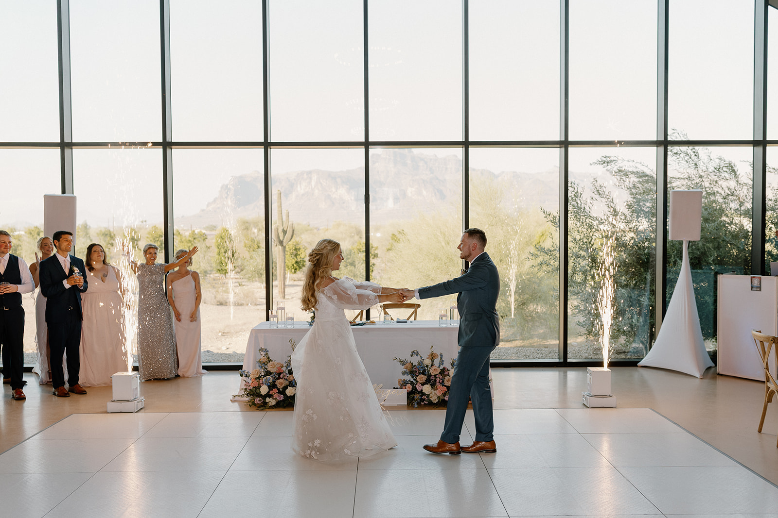 Bride and groom dance together during emotional first dance as husband and wife.