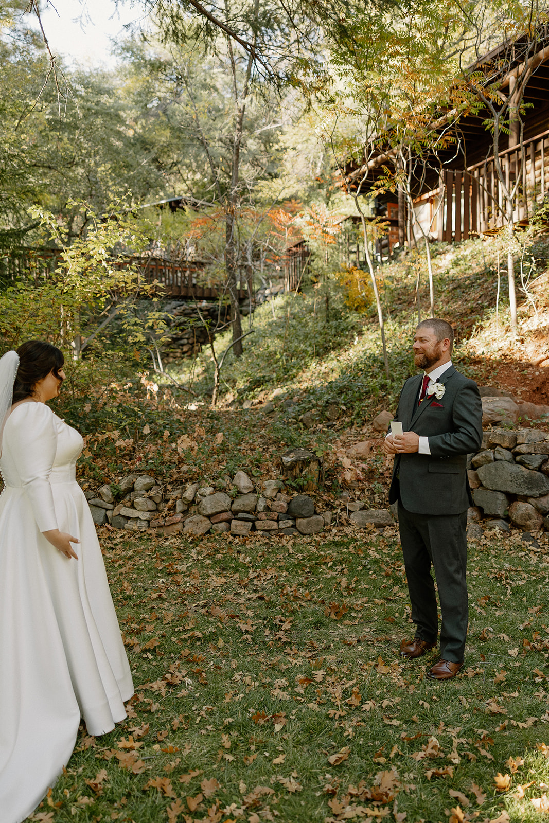 First look moment between bride and groom outdoors at a Sedona wedding venue