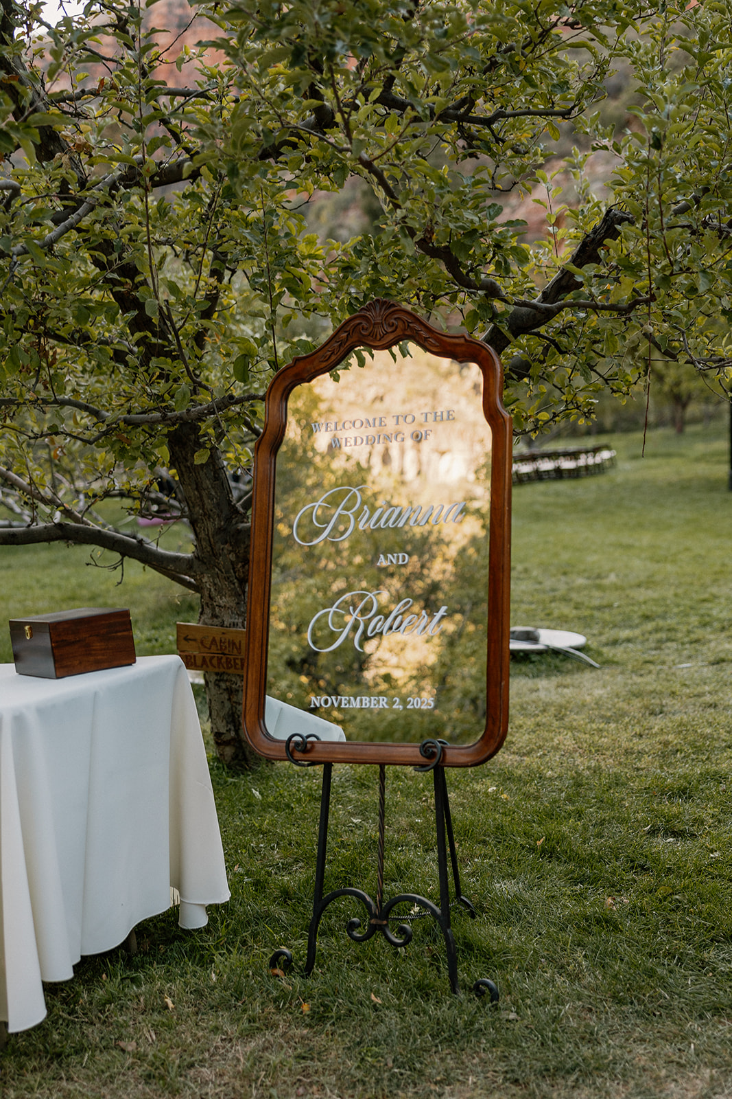 Welcome sign for Brianna and Robert’s wedding displayed outdoors at a Sedona wedding venue