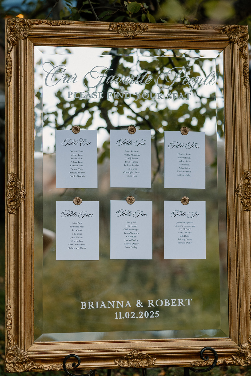 Custom seating chart sign displayed outdoors at a Sedona wedding venue
