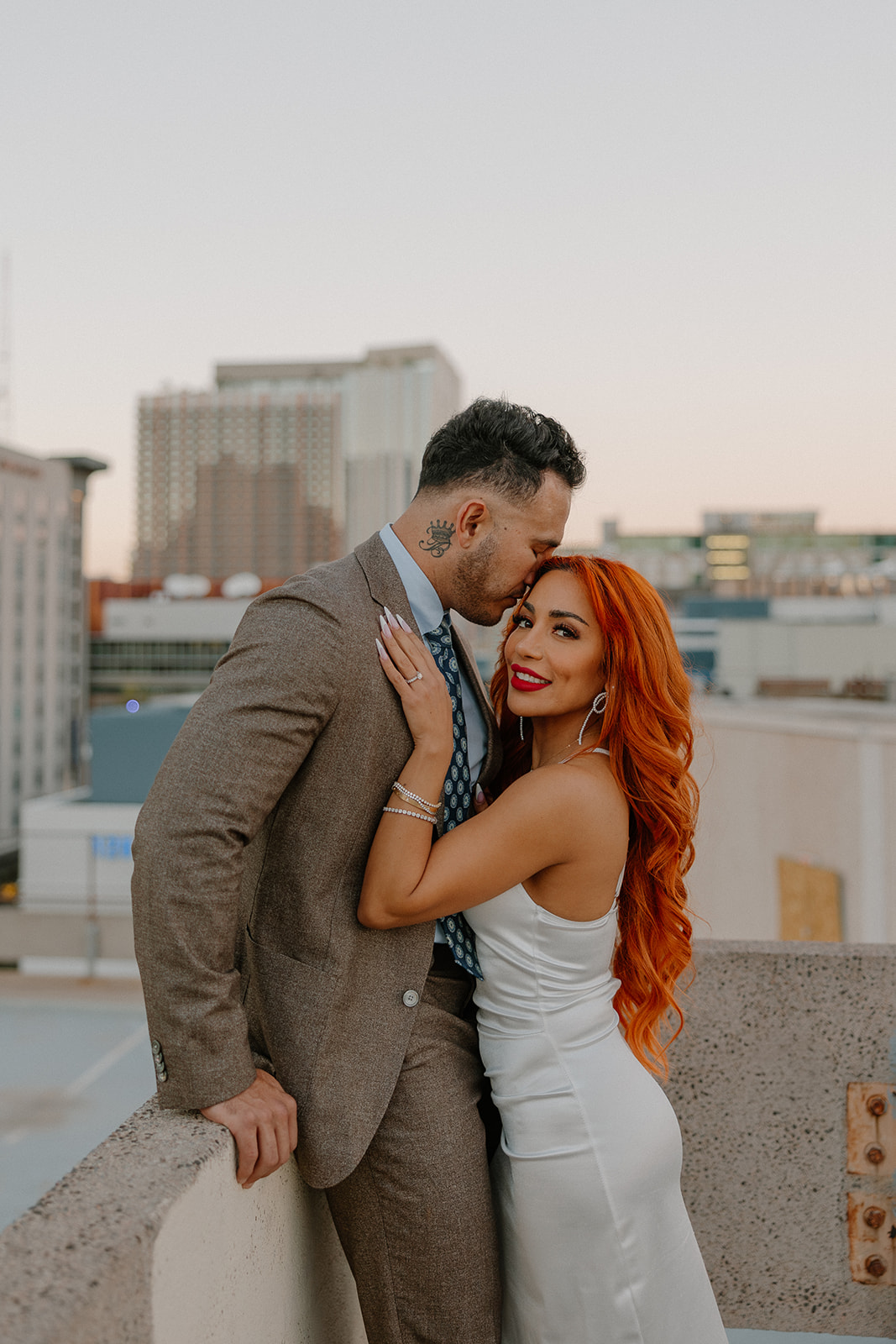 Romantic rooftop portrait during phoenix engagement photos in downtown Phoenix
