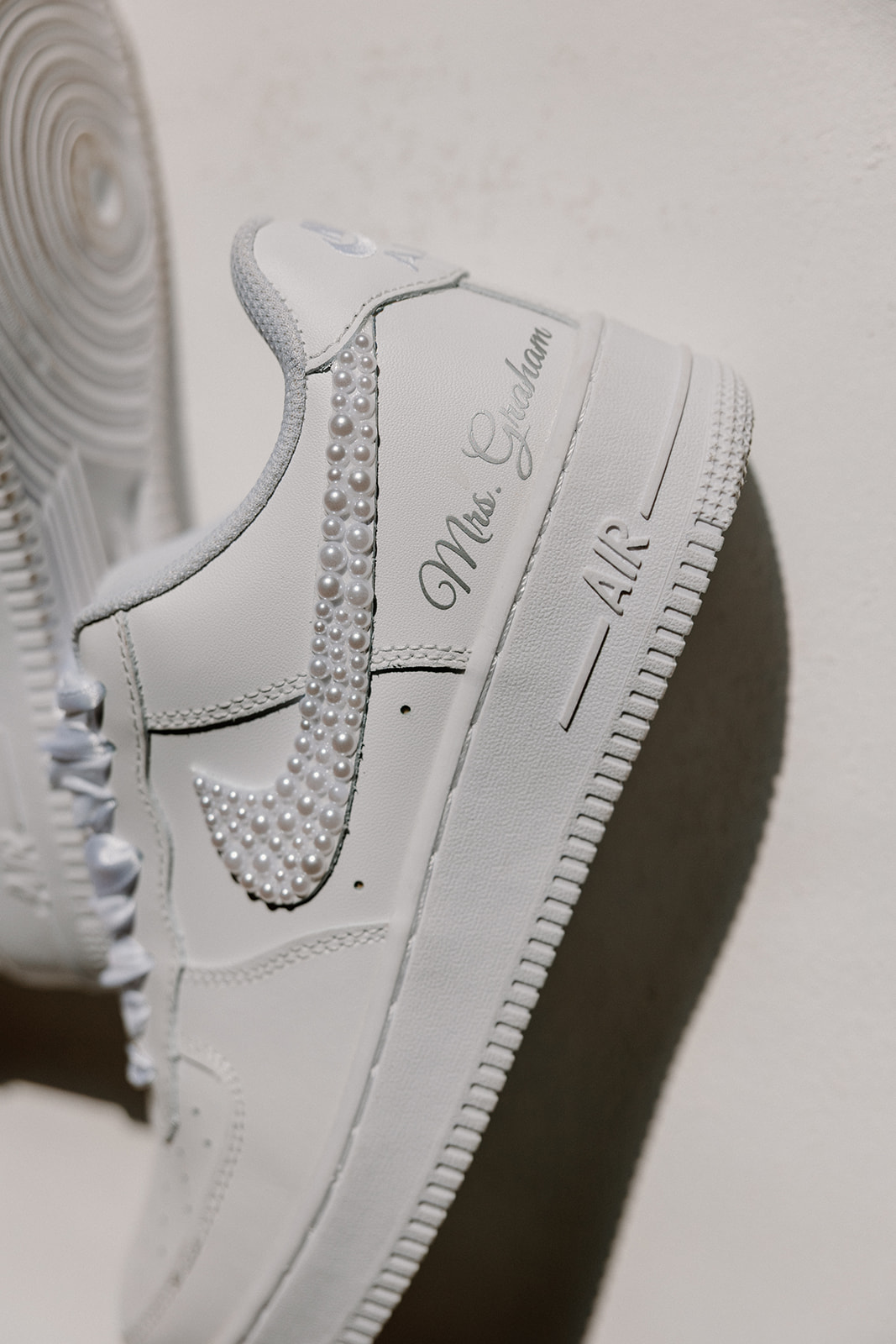 Custom white Nike Air Force 1 wedding shoes with pearl details