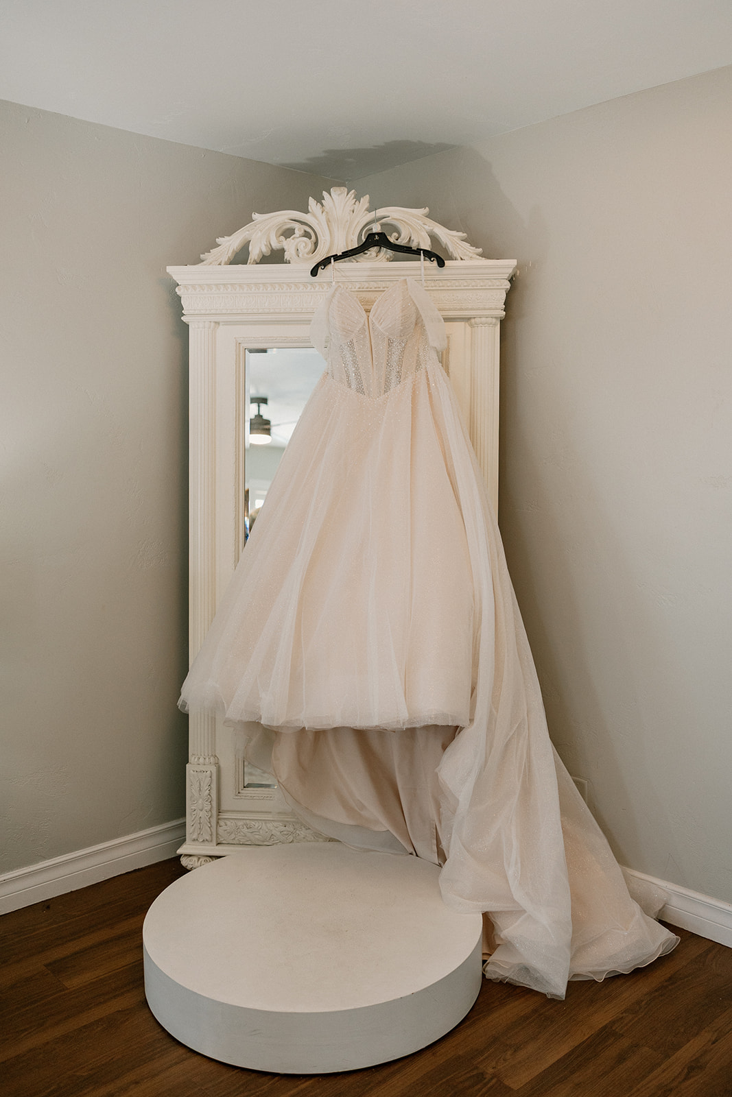 Wedding dress hanging in bridal suite at Stonebridge Manor Wedding Venue
