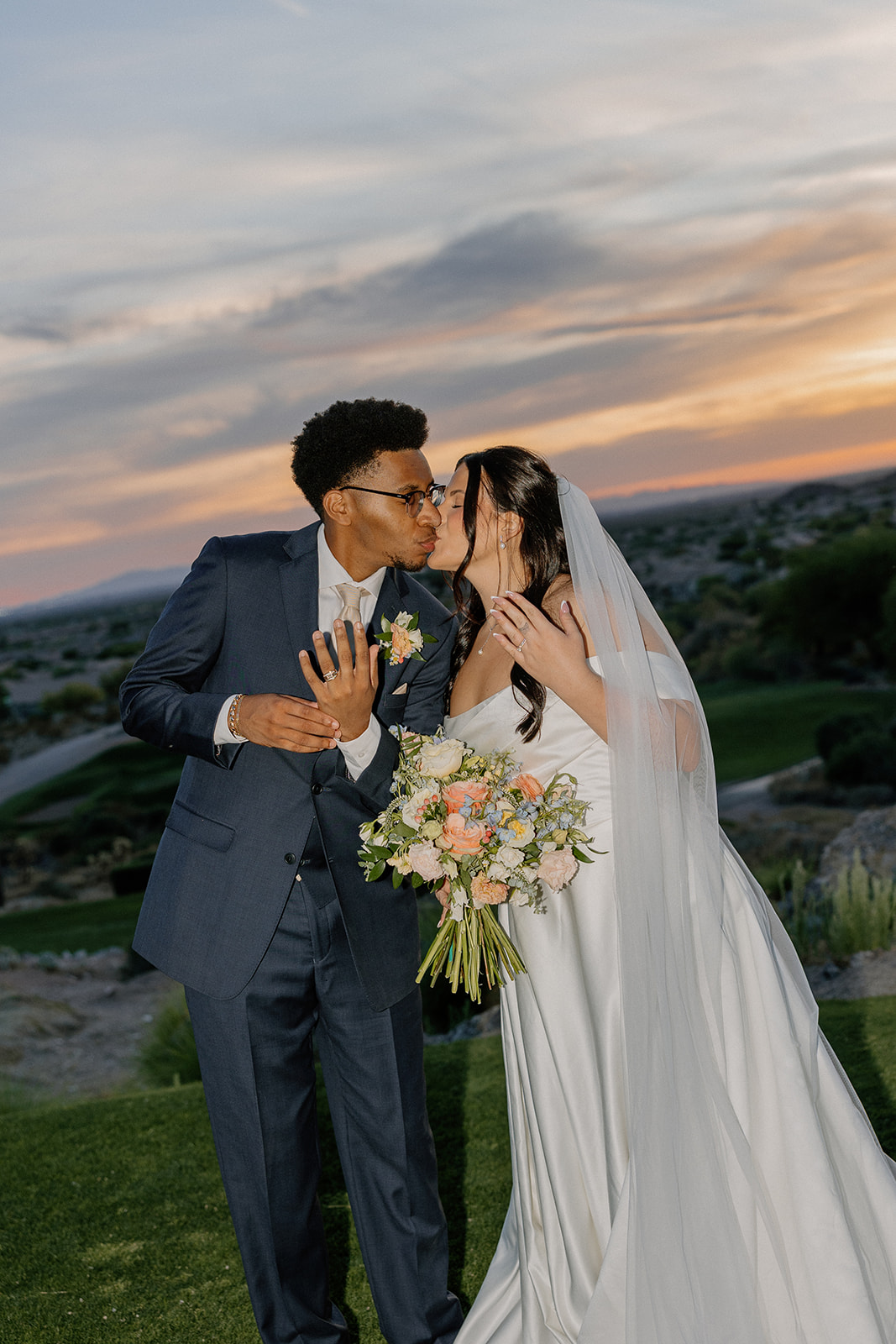 ceremony setup with white chairs and mountain backdrop at gold canyon golf resort wedding