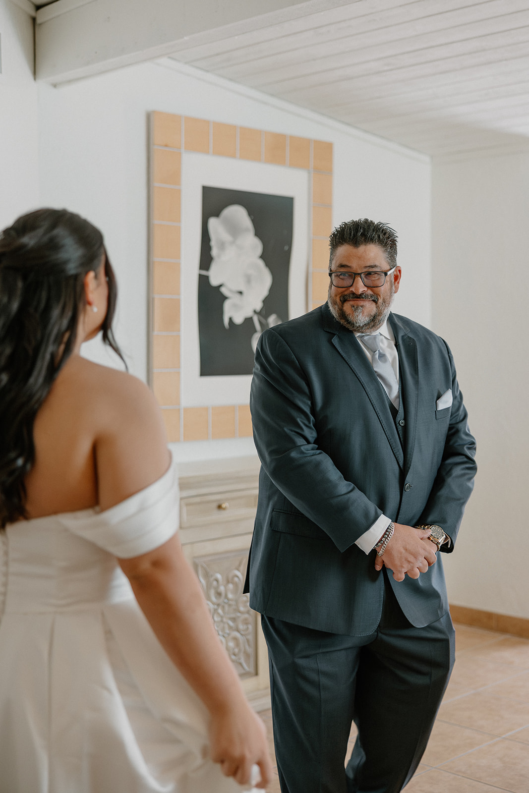 father seeing bride for first time during emotional first look moment at gold canyon golf resort wedding