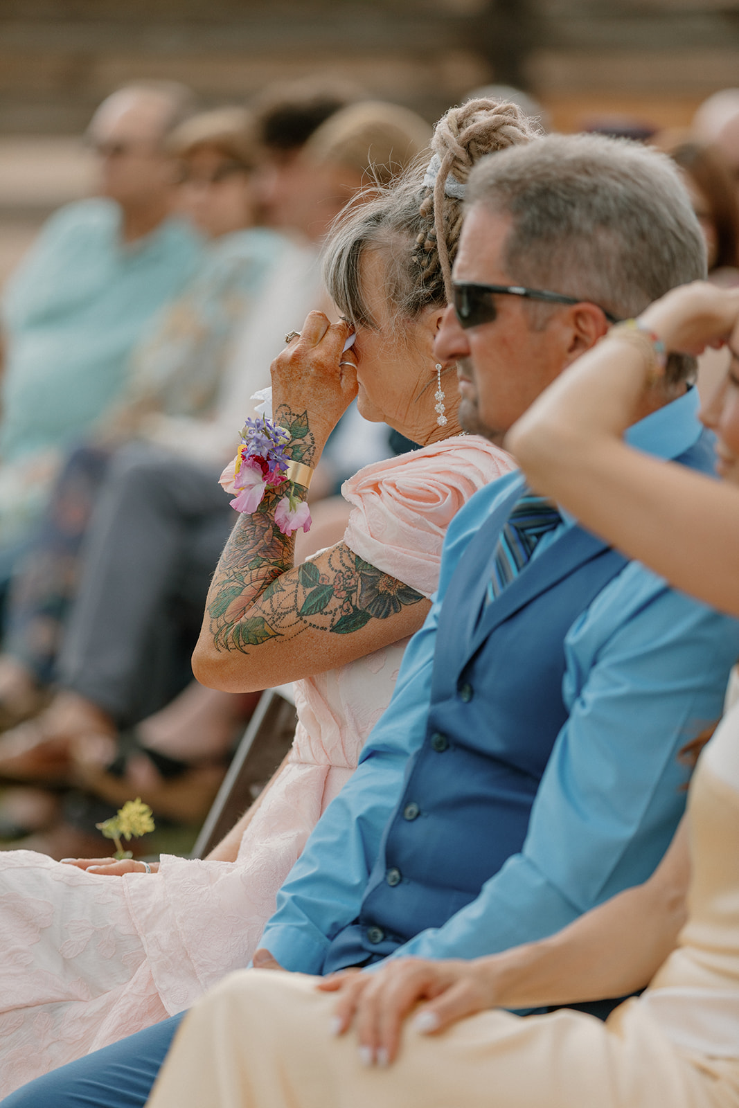 Wedding guests crying during a wedding ceremony