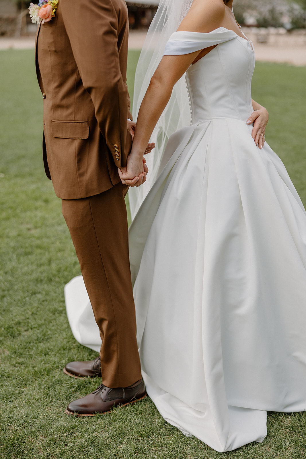 A bride and groom during their first touch
