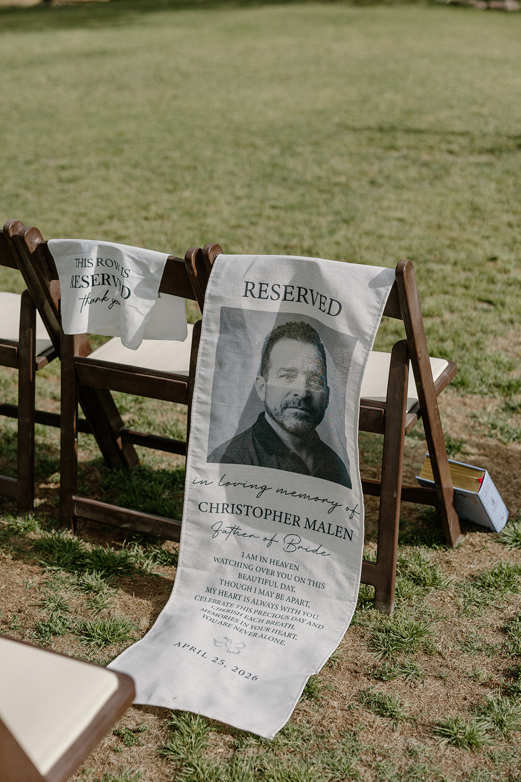 A chair reserved for the bride's late father as a wedding detail