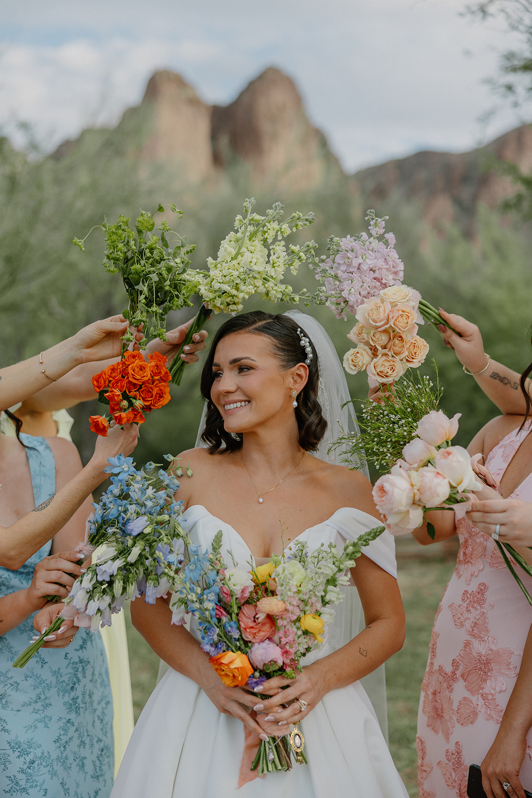 A bride surrounded by wedding details as a bridesmaid photo ideas