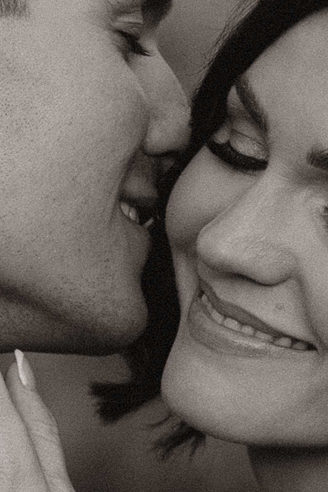 A black and white photo of a bride and groom
