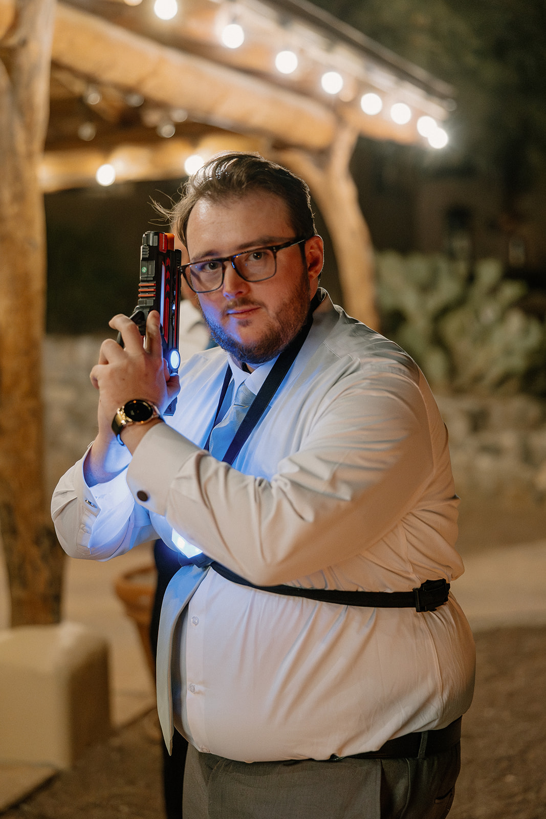 Wedding guests playing laser tag