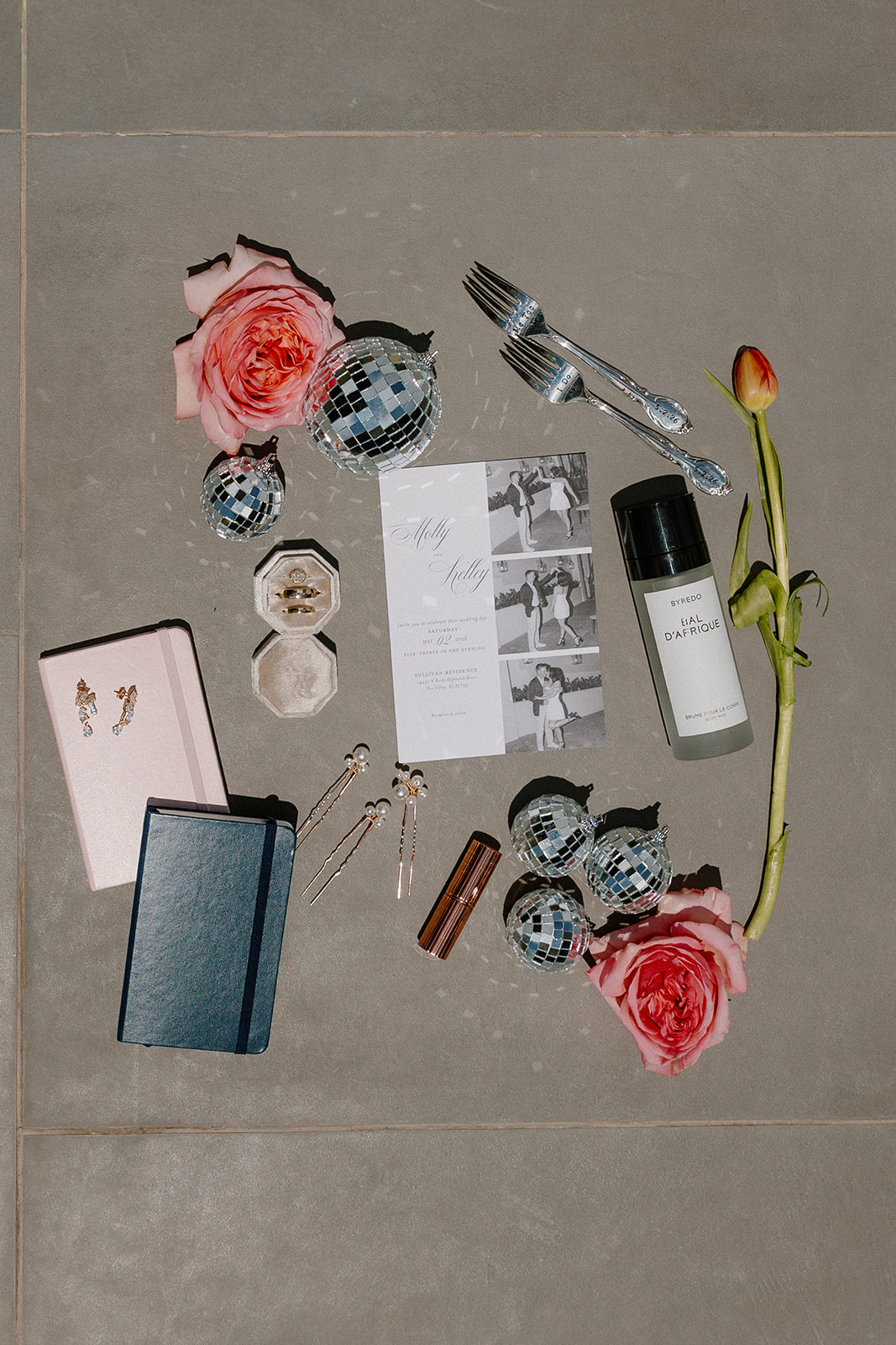 A wedding flat lay from a backyard wedding