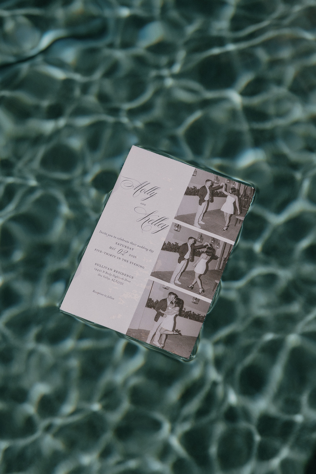 A wedding invitation in a pool