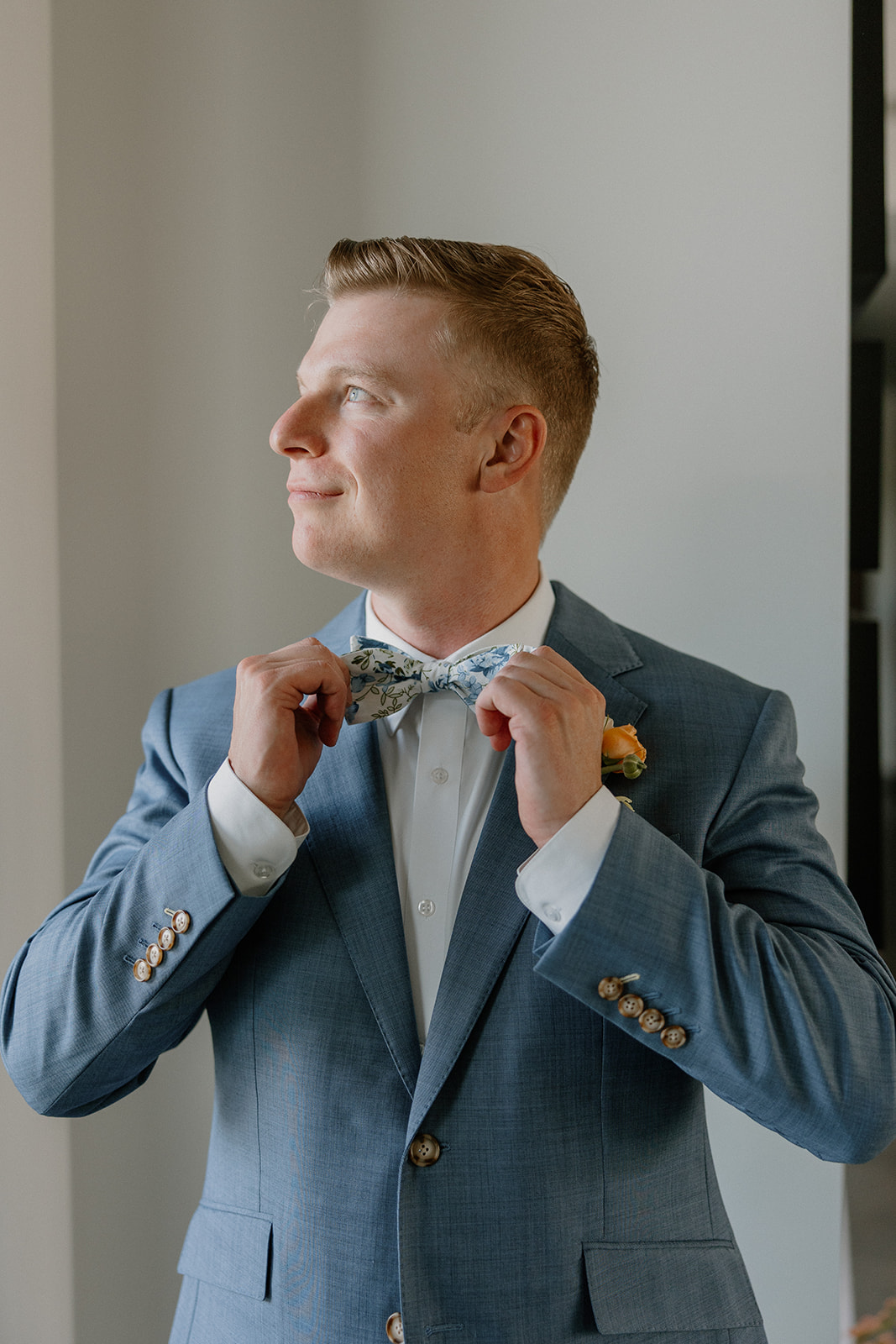 A groom getting ready for a wedding