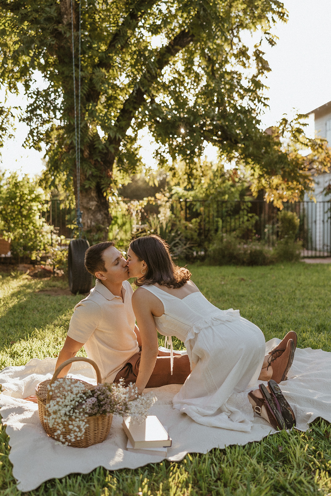 A couple during a picnic for engagement photos