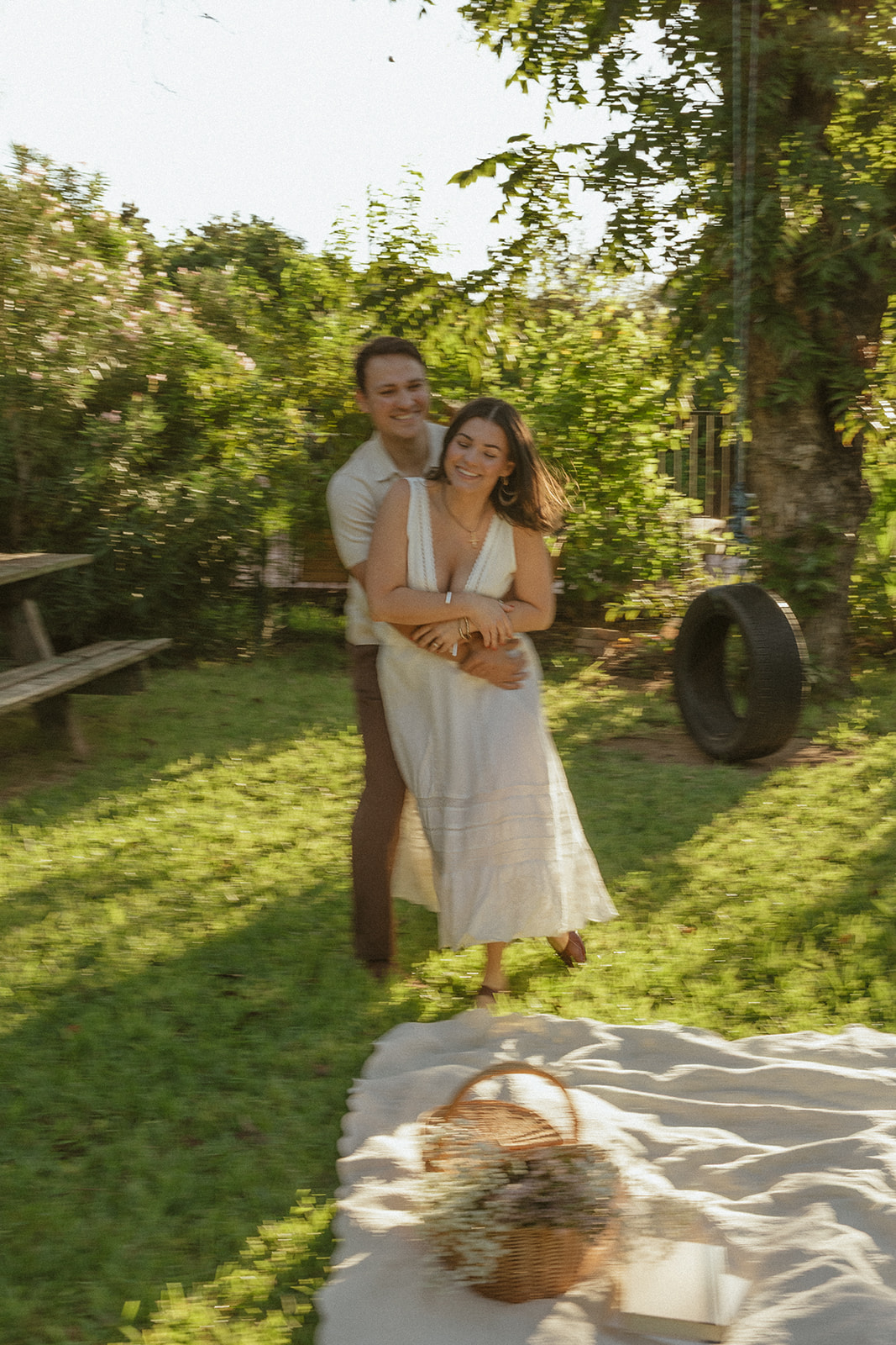A couple running during their engagement photos