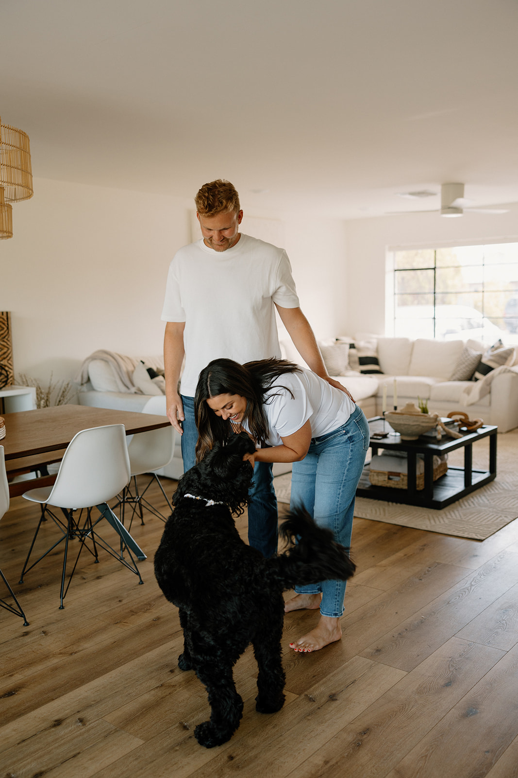 A couple dancing in at home engagement photos